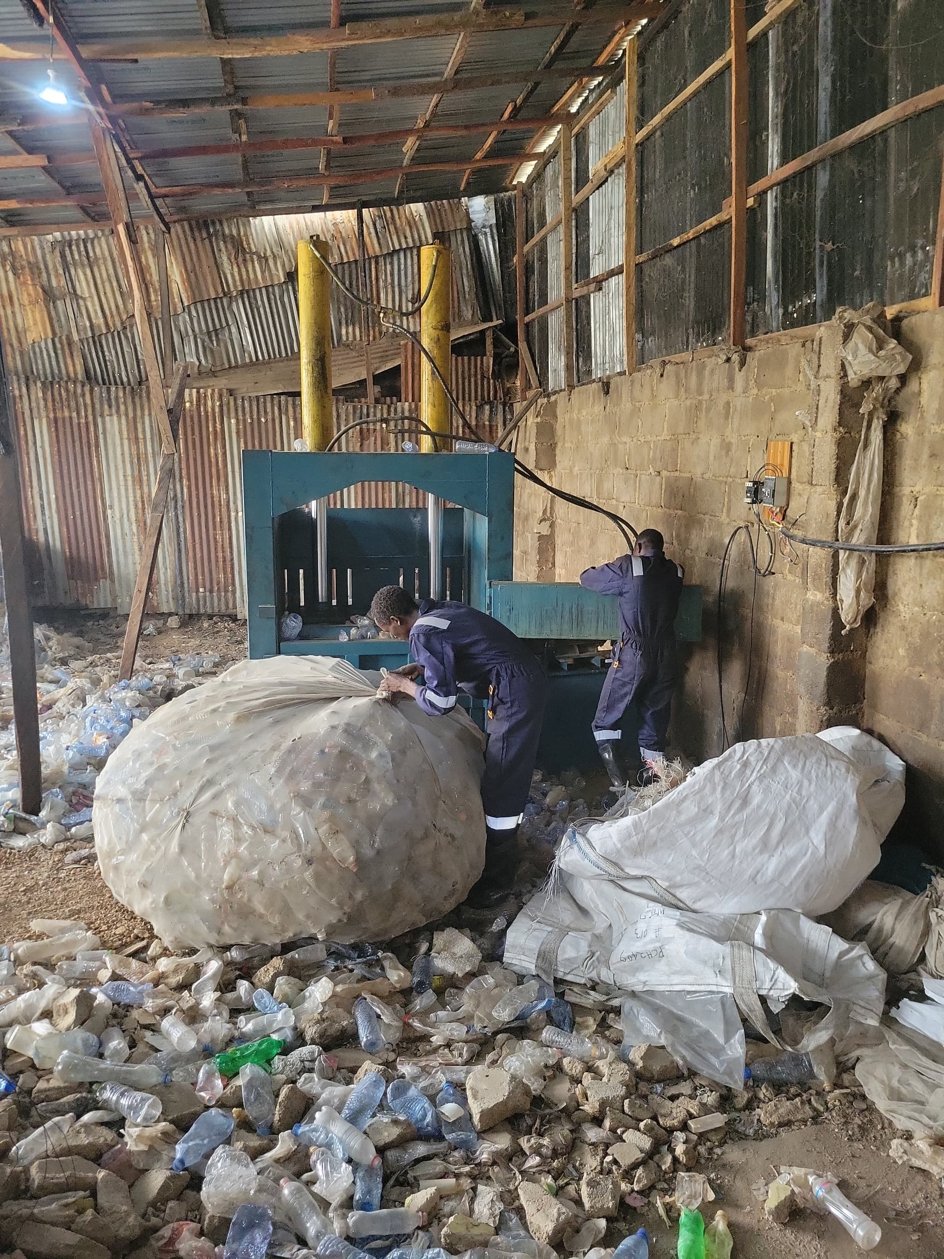 Workers at recycling plant